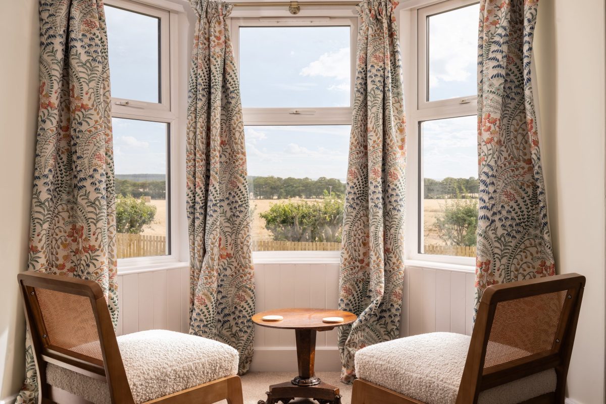 Master bedroom with view of rolling fields to the south